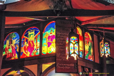 Coloured glass depicting medieval scenes
